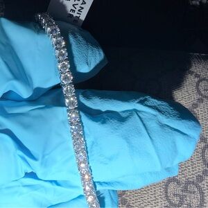 MOISSANITE
925 SILVER
6.00CTW
$1000.00
 Bracelet 3mm size 7 in